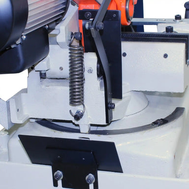 A image showing the saw head pivot and spring mechanism on the CS-275EU cold saw, manufactured by Baileigh