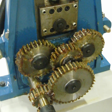 A up close image taken of the gears installed on the Baileigh R-M10  roll bender