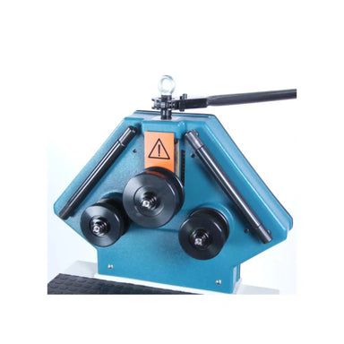 A image of the head on the R-M40 roll bender, manufactured by baileigh. The image shows the rollers, ratchet and full front of the roll bender.