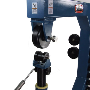A close up image of the Baileigh EW-40 showing the wheels installed on the machine