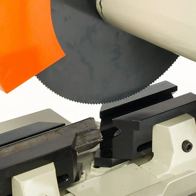 A up close image of the Baileigh CS-350M showing the saw blade, vise and blade guard