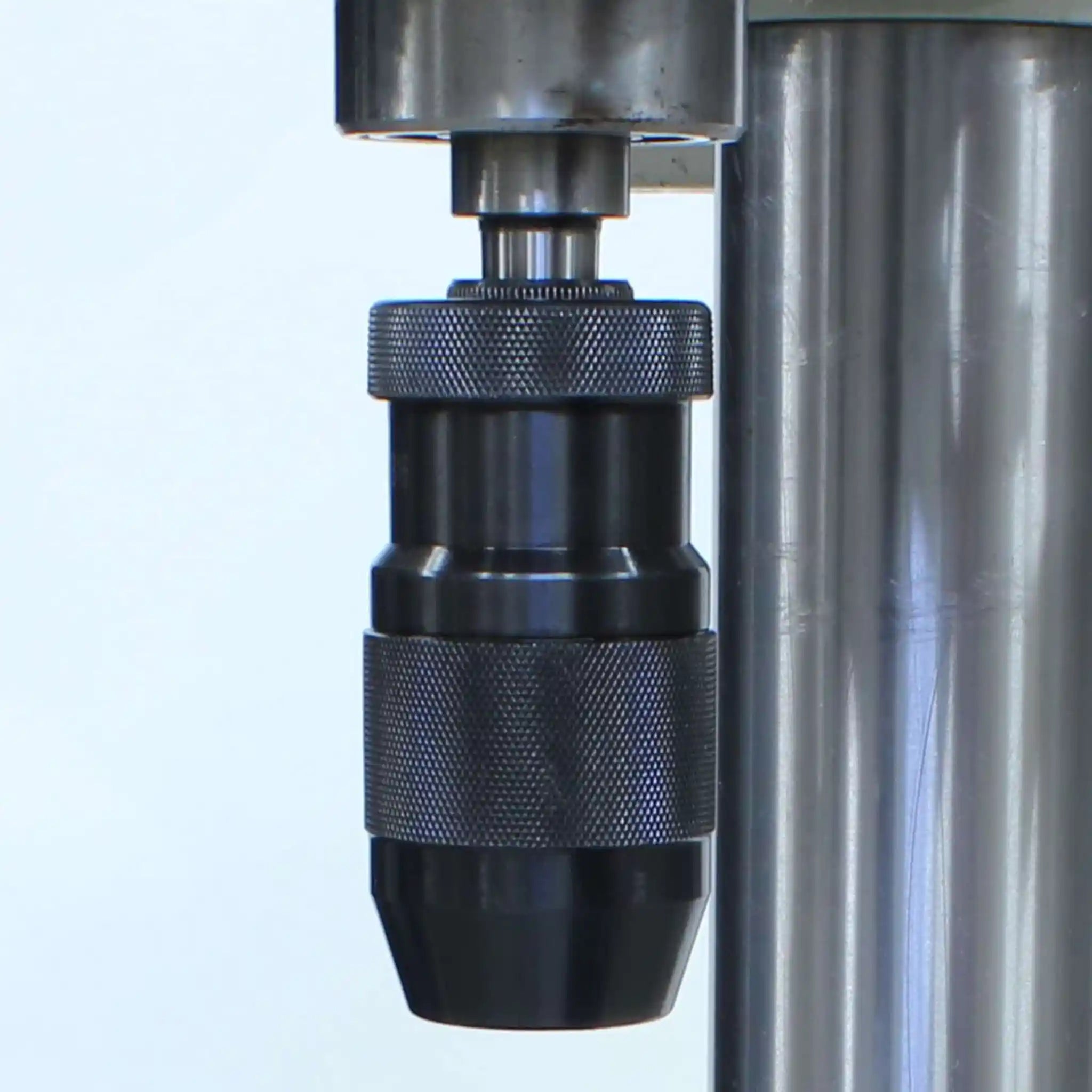 An up close image of the drill press chuck on the Baileigh DP-1000E