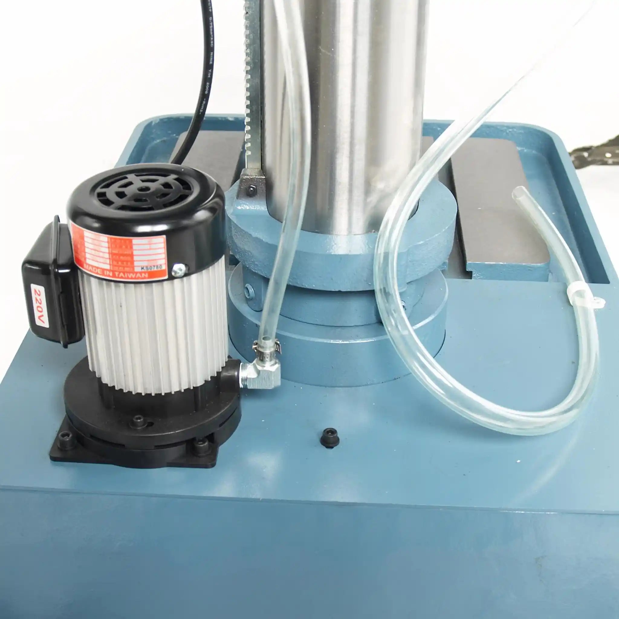 A image showing the coolant motor system on the DP-1250VS by Baileigh