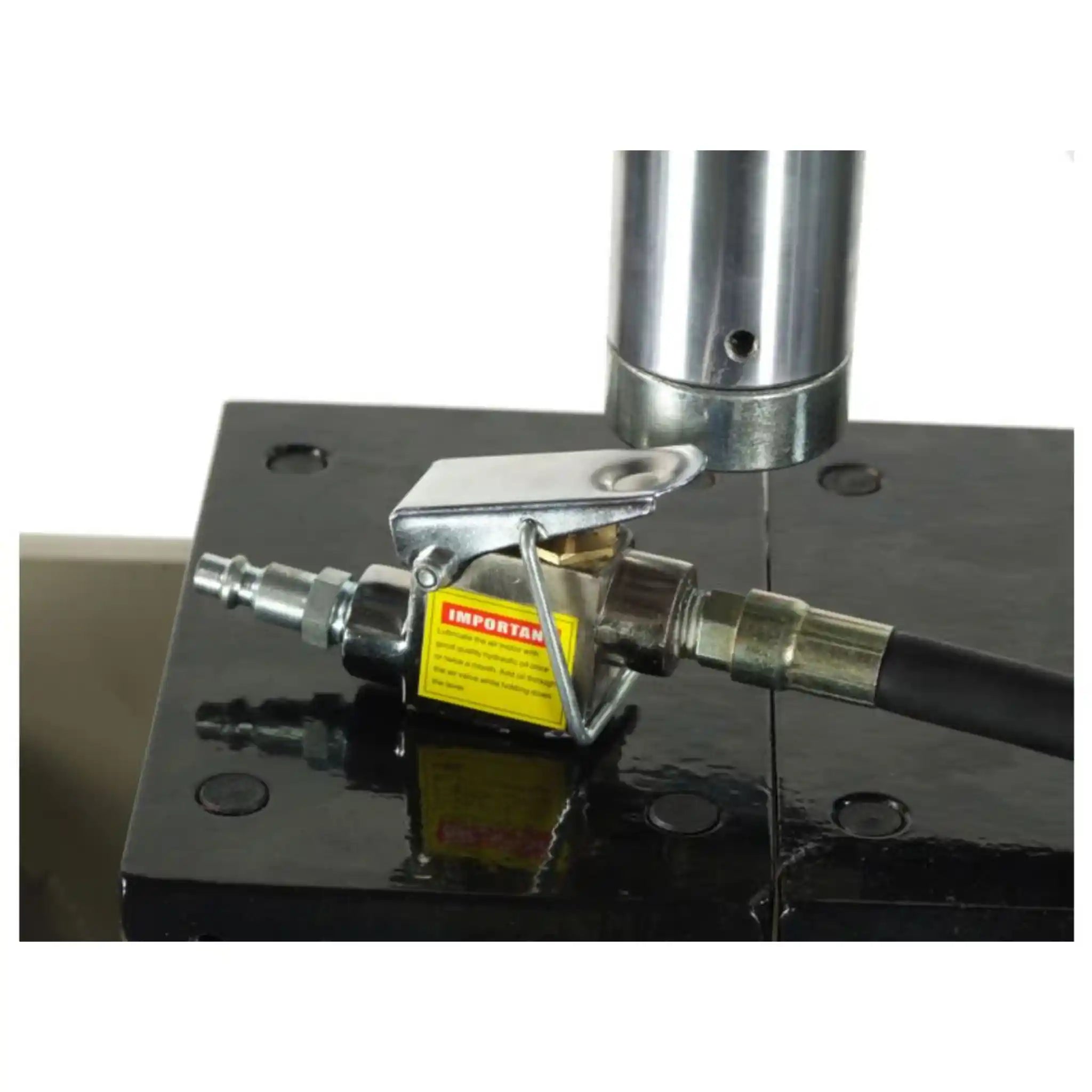 A close up image of the lubricator installed on a pneumatic press, the press is the HSP-20A manufactured by Baileigh