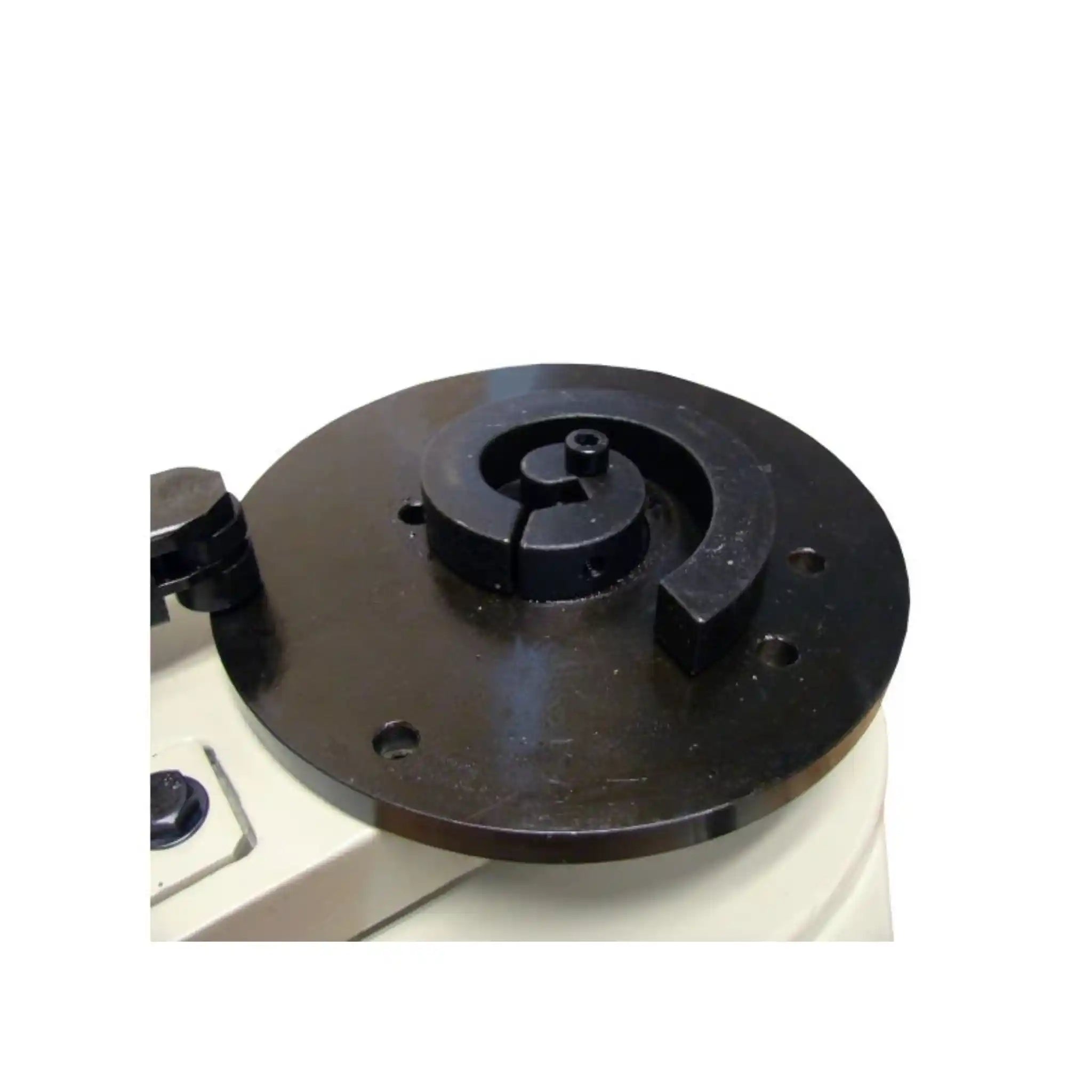 A image of the looser spiral die installed on a scroll bender, the Baileigh MPB-10