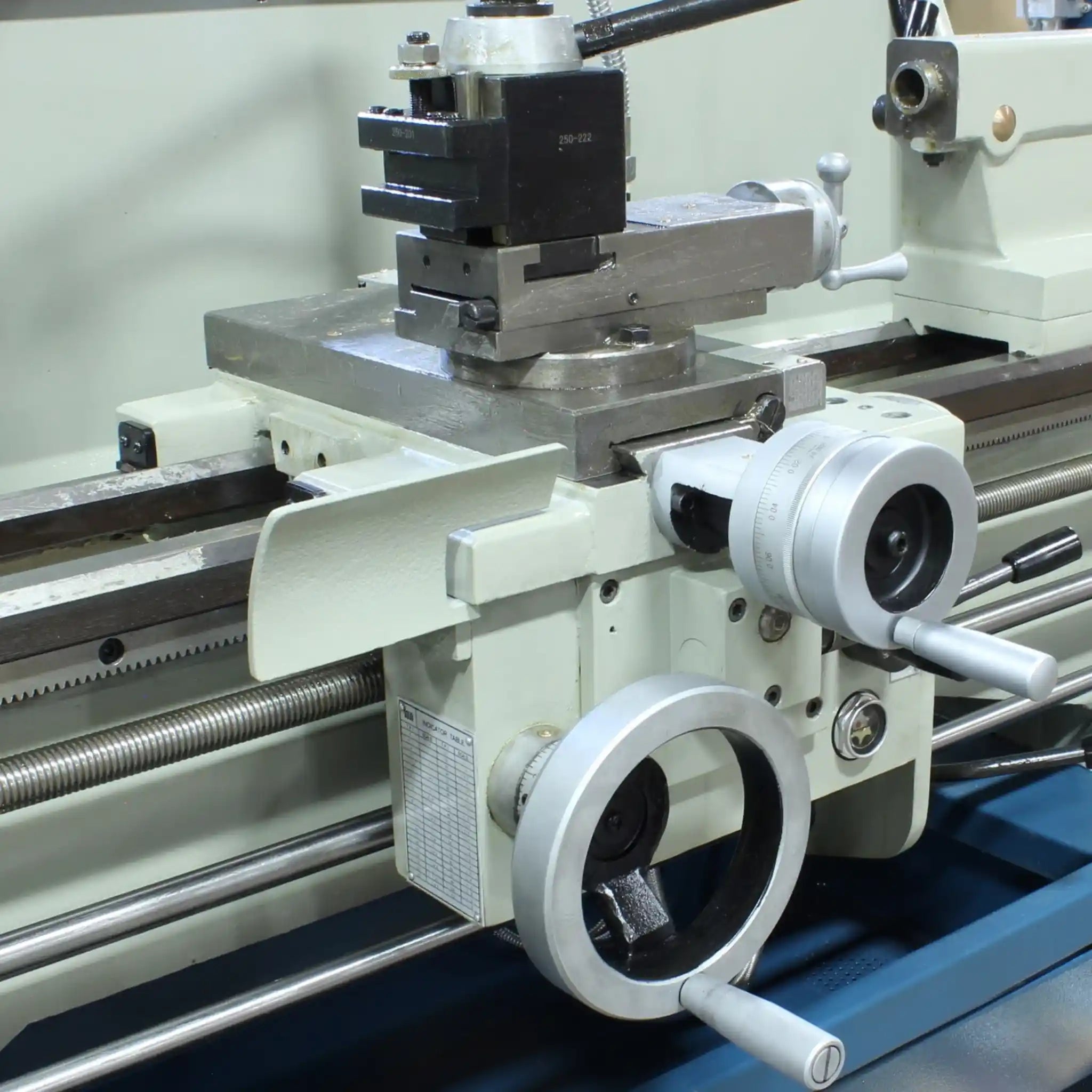 A close up image of the carriage assembly on the PL-1340E lathe, manufactured by Baileigh