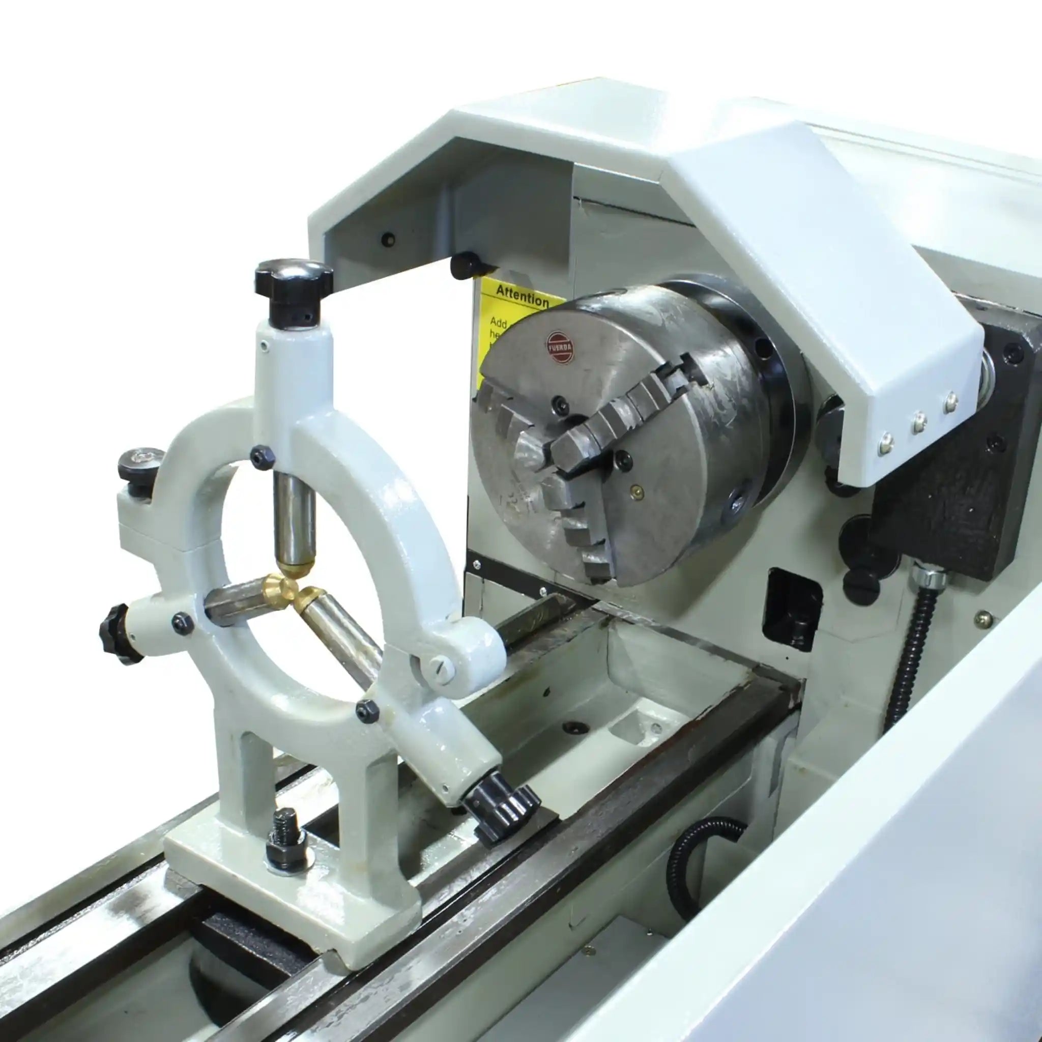 A image taken up close of the steady rest and chuck installed on the PL-1340E lathe