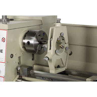 A close up of the chuck assembly and steady rest installed on the PL-1440E by Baileigh lathe