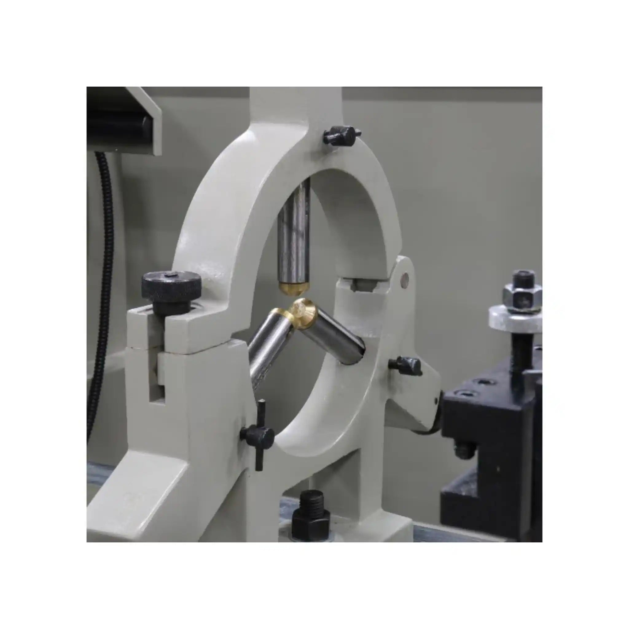 A close up taken of the steady rest installed on a lathe, the lathe is the Baileigh PL-1860E