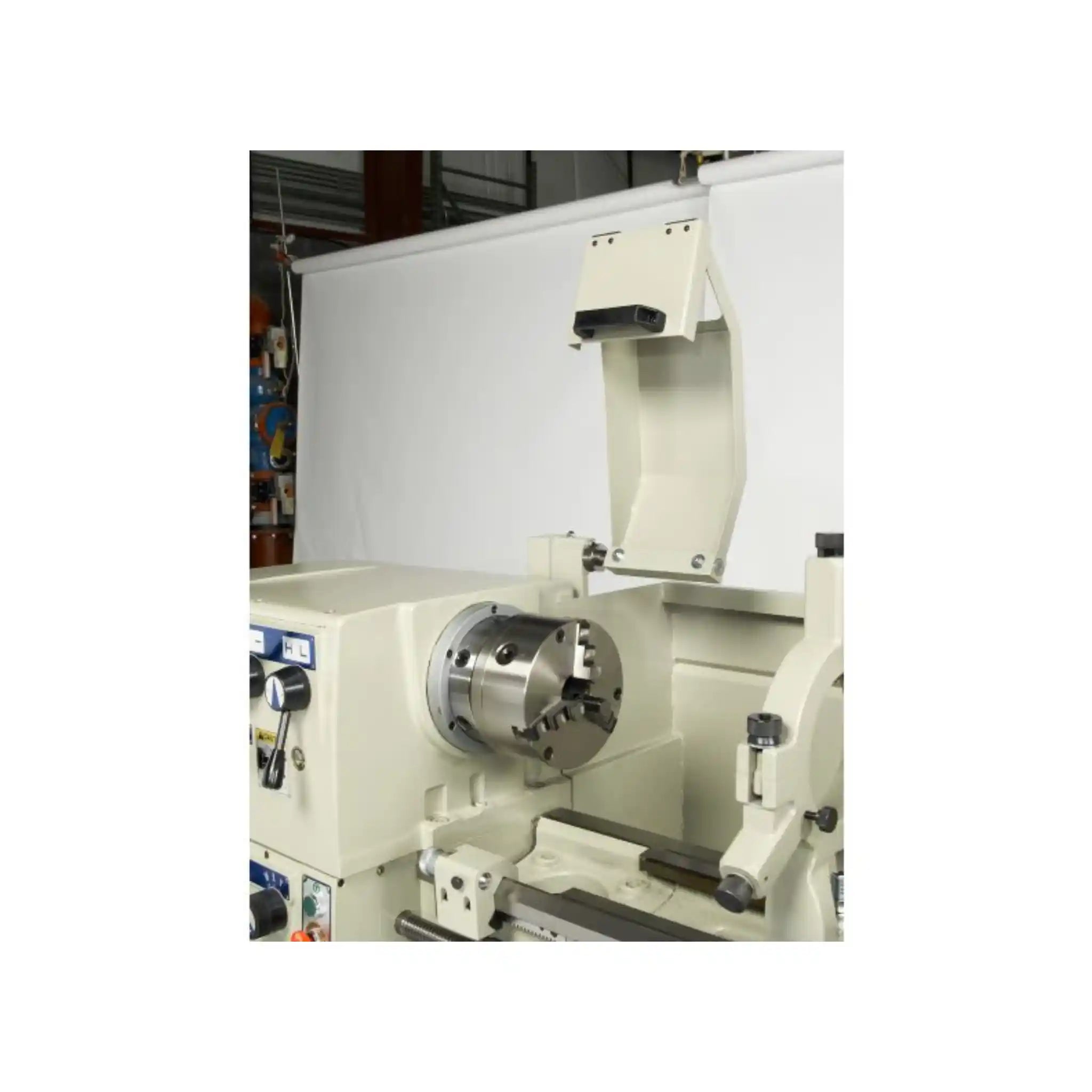 A image of a three jaw chuck installed on the Baileigh PL-1860, the image is taken from the front