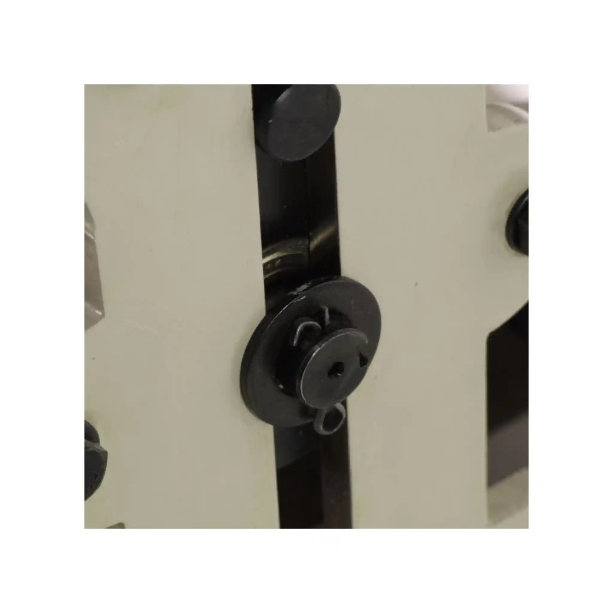 A image taken from the back of the Baileigh R-M7, showing the back pins and slots