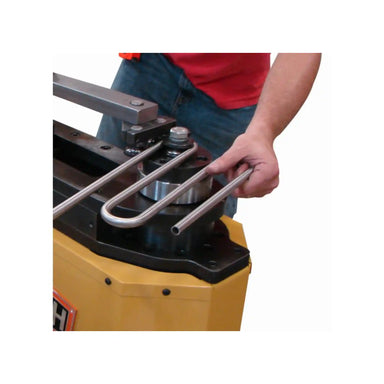 A image of the Baileigh RDB-250 in action, showing a pipe being bent using the machine