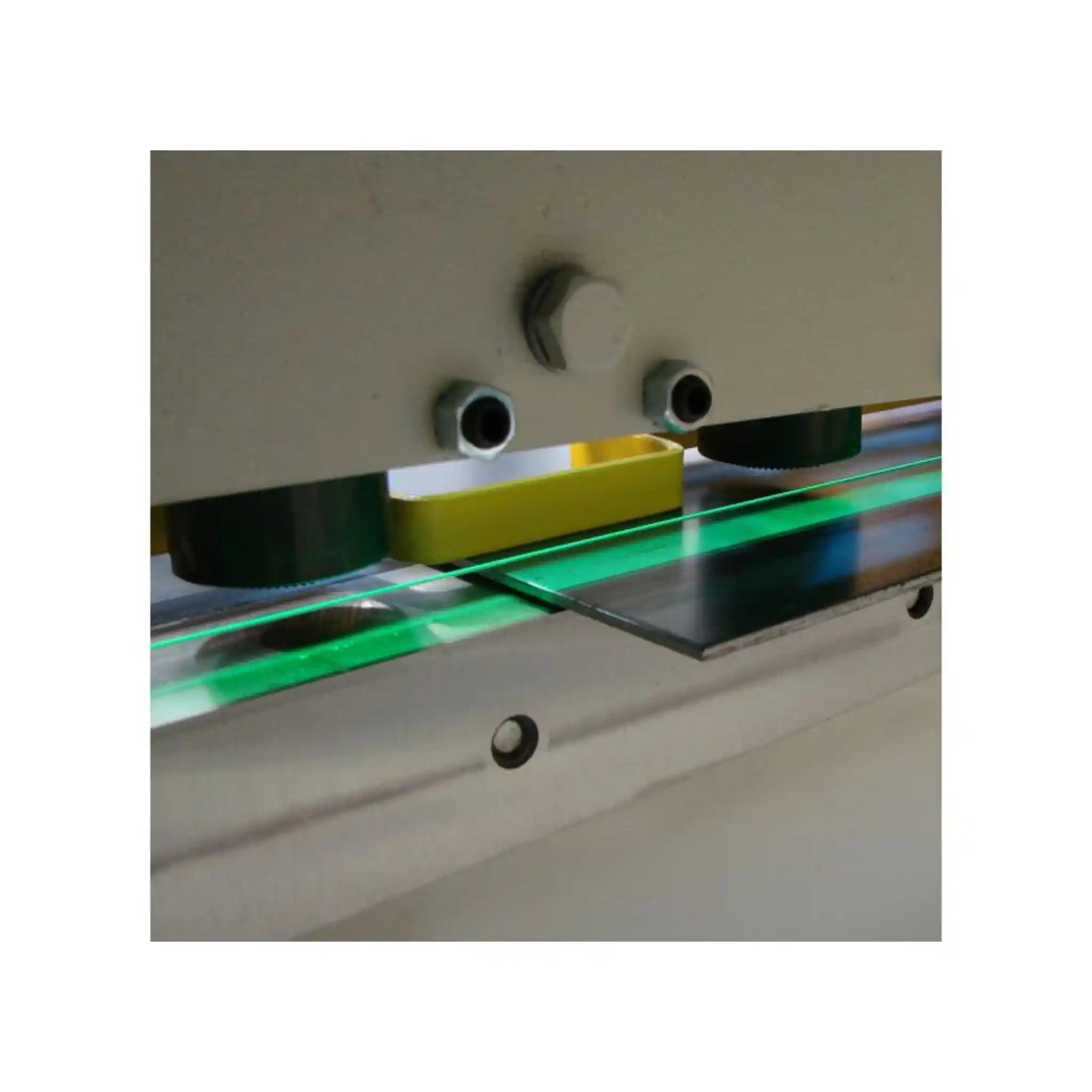 A image showing the laser cutting line activated on the Baileigh SH-5203-HD shear, showing where the shear will take place