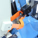 A close up image of the horizontal bandsaws blade brush system