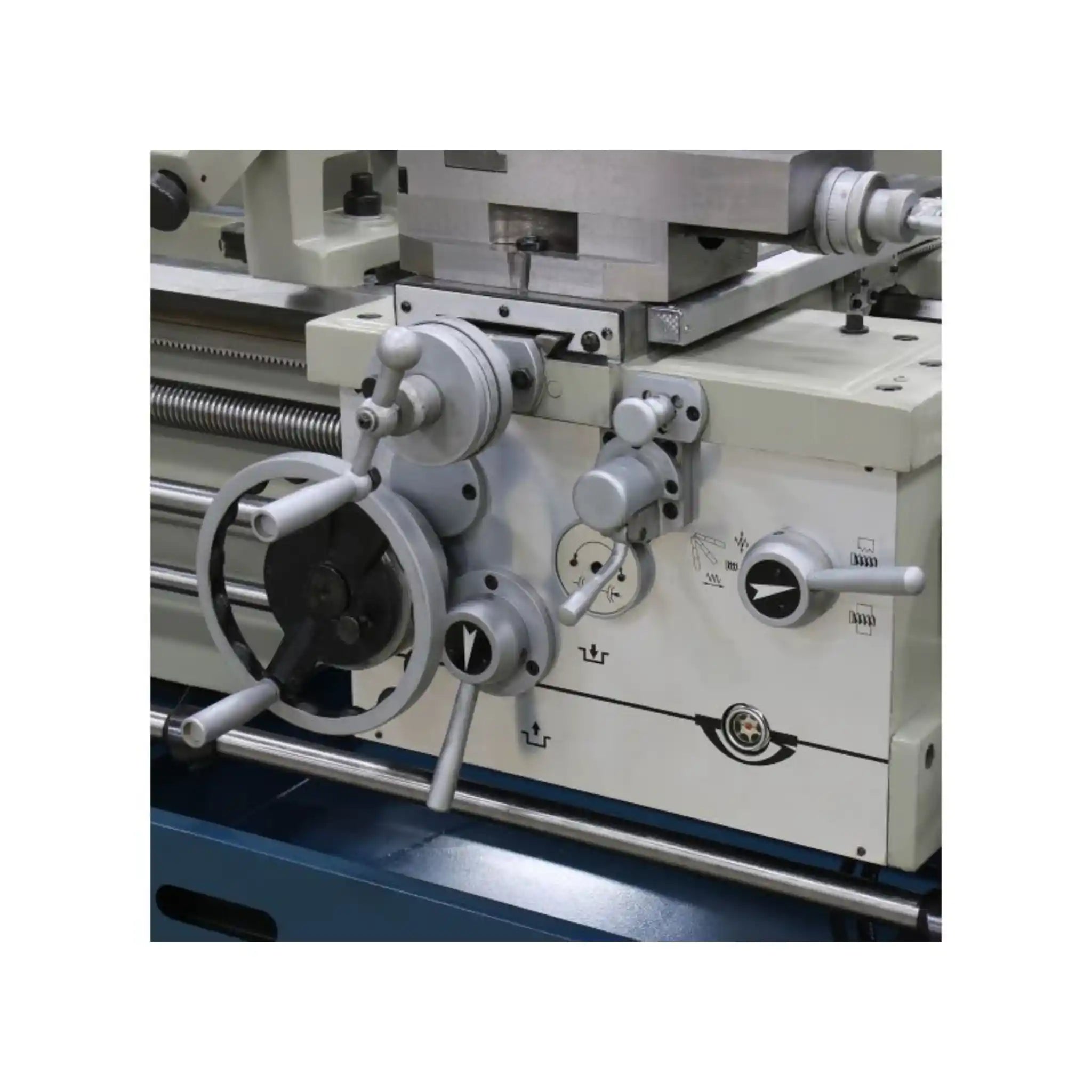 A image taken up close of the carriage and controls to operate the carriage on the Baileigh PL-1860E lathe