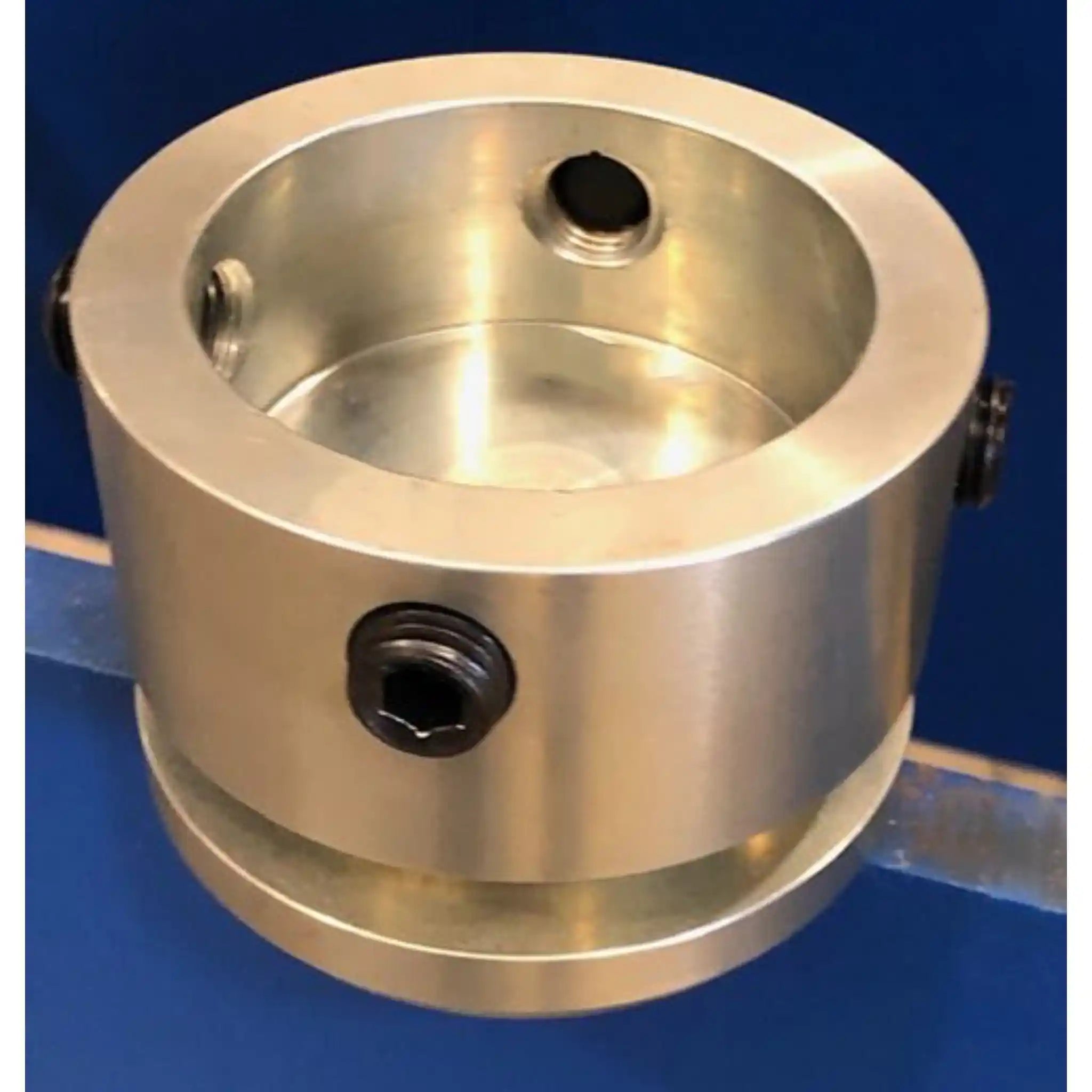 A image showing the cylinder cap facing down, showing the threaded screws used to attach the end cap to the hydraulic piston, the machine is the Profi Press 100 Ton M/H-M/C-2 With 1500mm Working Width