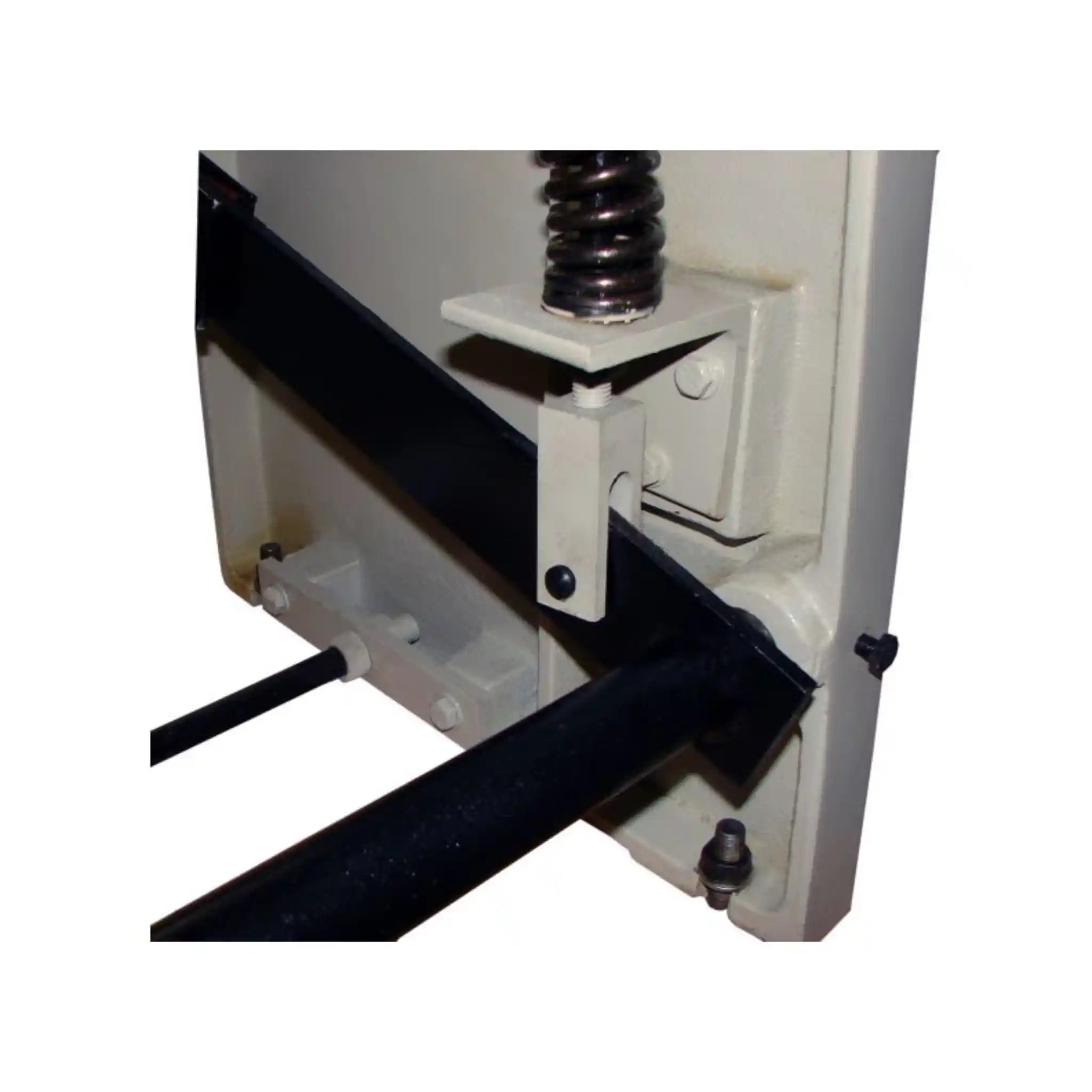 A up close image taken of the Baileigh SF-5216E, the image shows the foot pedal linkage mechanism