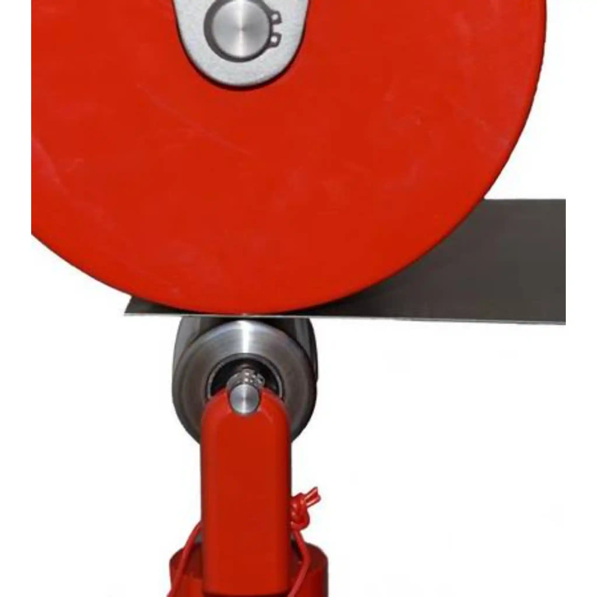 A image showing the JS Tools english wheel at work, shaping a piece of metal