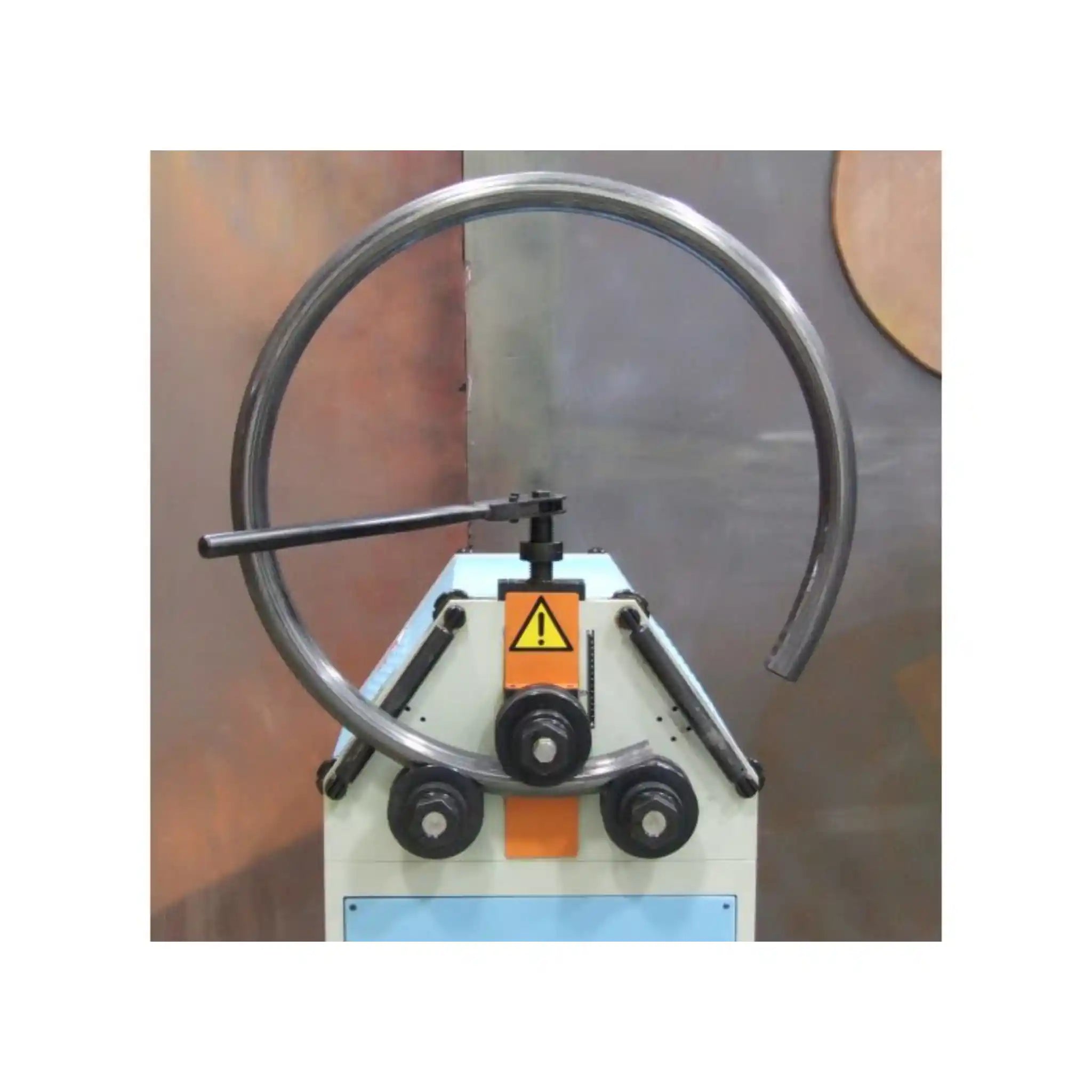 A image taken of the R-M55 roll bender manufactured by Baileigh in action, bending a tube