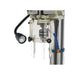 A close up image of the work light and chuck installed on the Baileigh DP-1500G